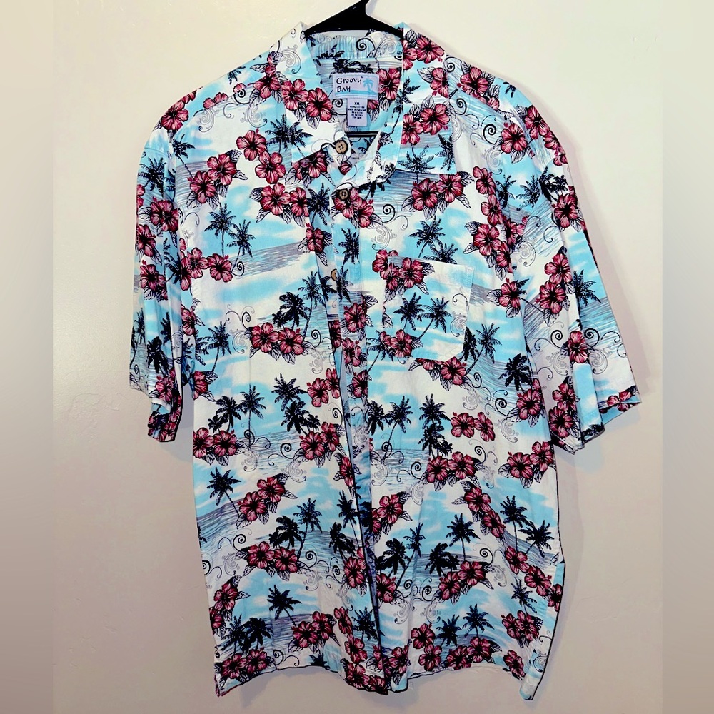 GROOVY BAY HAWAIIAN SHIRT
Blue and Pink Palm Tree and Flowers Button Down Shirt